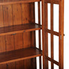 Perspective view with both glass doors open revealing three levels of internal display shelving for dinnerware