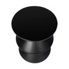 Direct overhead shot focusing on the smooth circular tabletop and uniform matte black texture