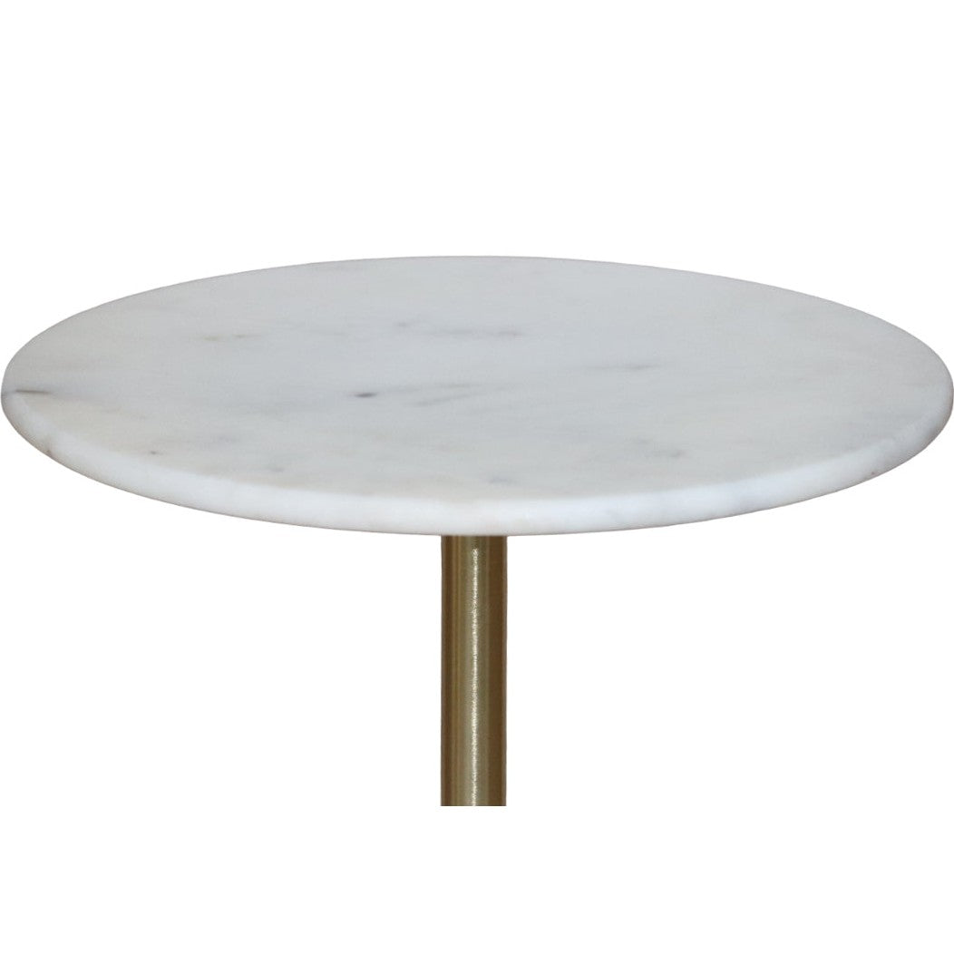 Close-up perspective shot highlighting the smooth polished surface and subtle grey veining of the round white marble tabletop