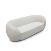 Angled left view of Clara curved sofa with minimalist contemporary design