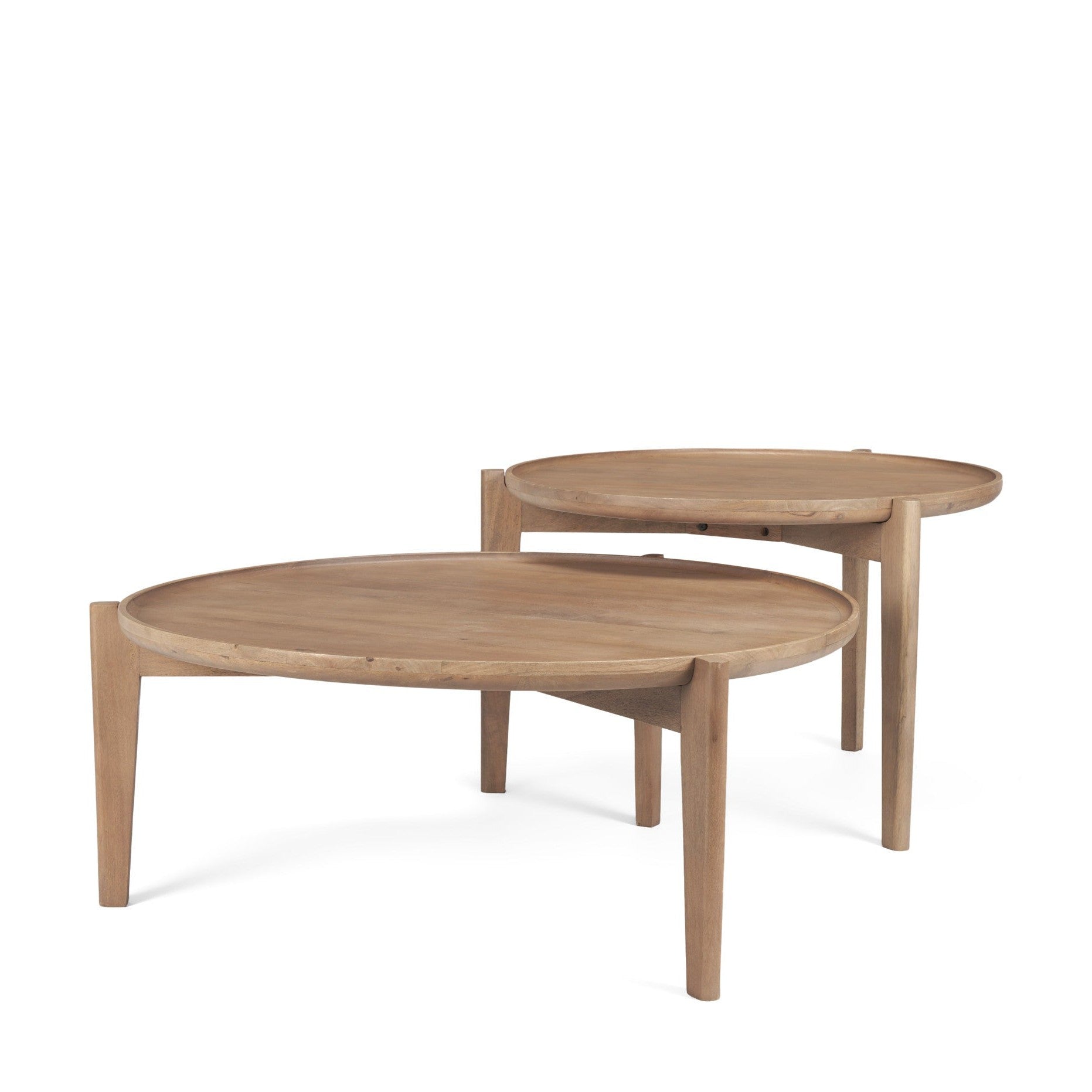 Three-quarter perspective showing the 40-inch and 31-inch round wood tables partially nested for a layered look