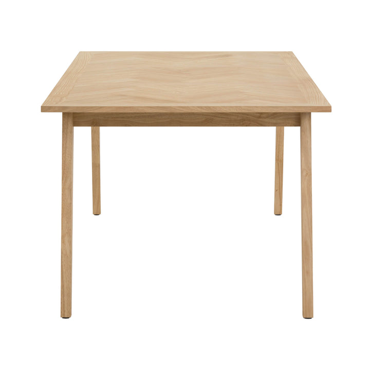 Straight-on side profile view highlighting the slim tabletop depth and the clean architectural lines of the natural oak legs