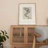 Wide-angle lifestyle shot featuring the sideboard as part of a complete natural wood dining furniture collection