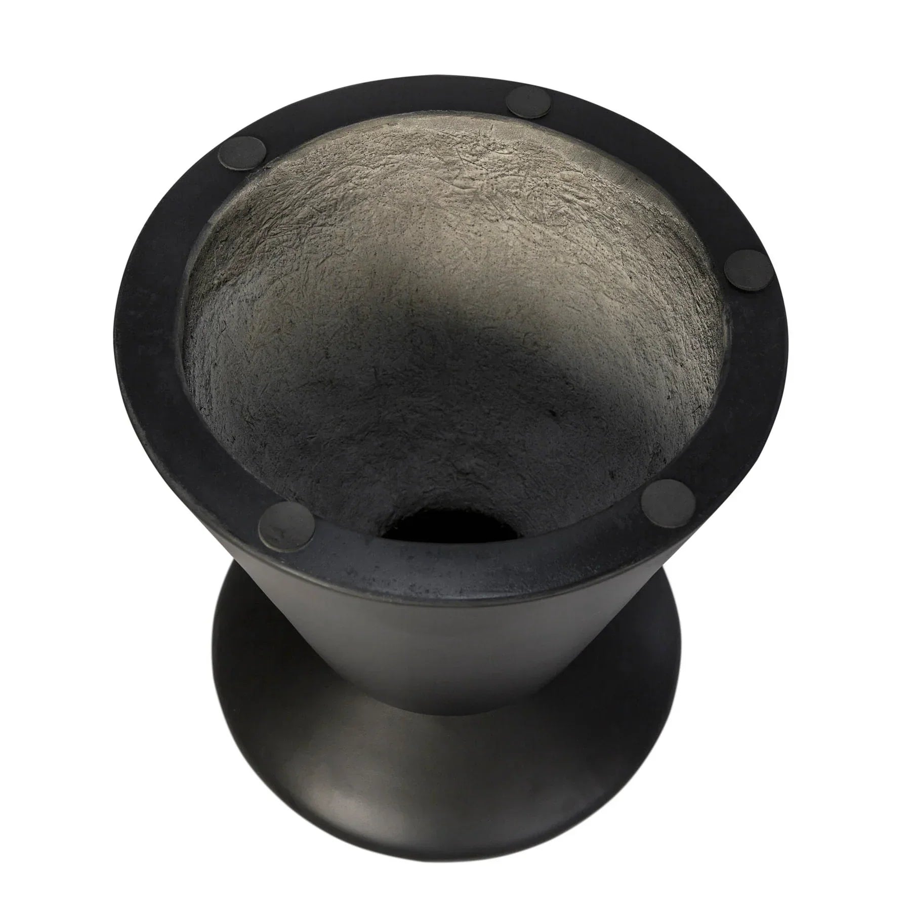 Three-quarter view of the Concrete Mineral side table featuring a matte black finish and a bold sculptural silhouette with a tapered pedestal base