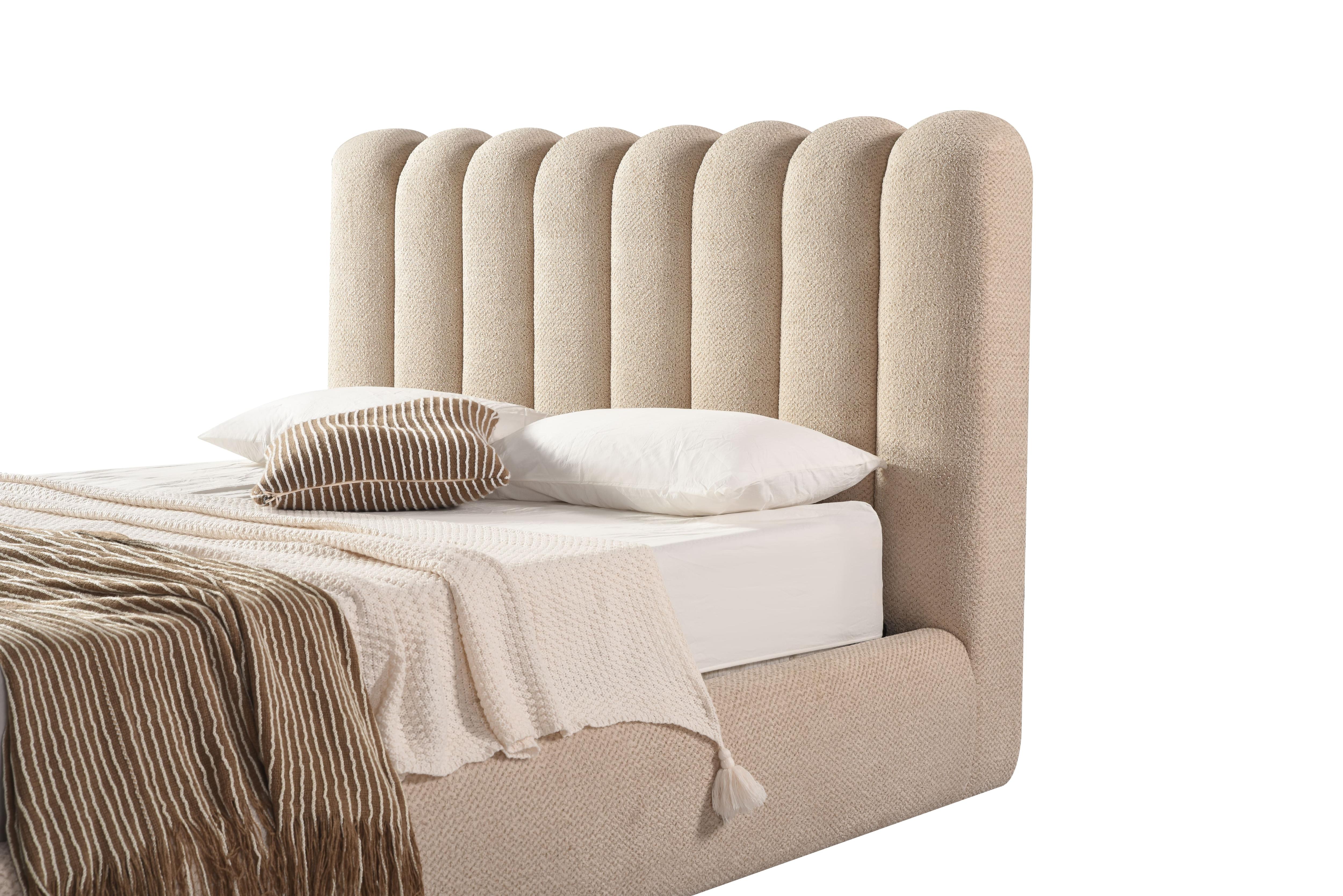 Front view of the Eira upholstered storage bed featuring a cream bouclé finish and a unique curved scalloped headboard