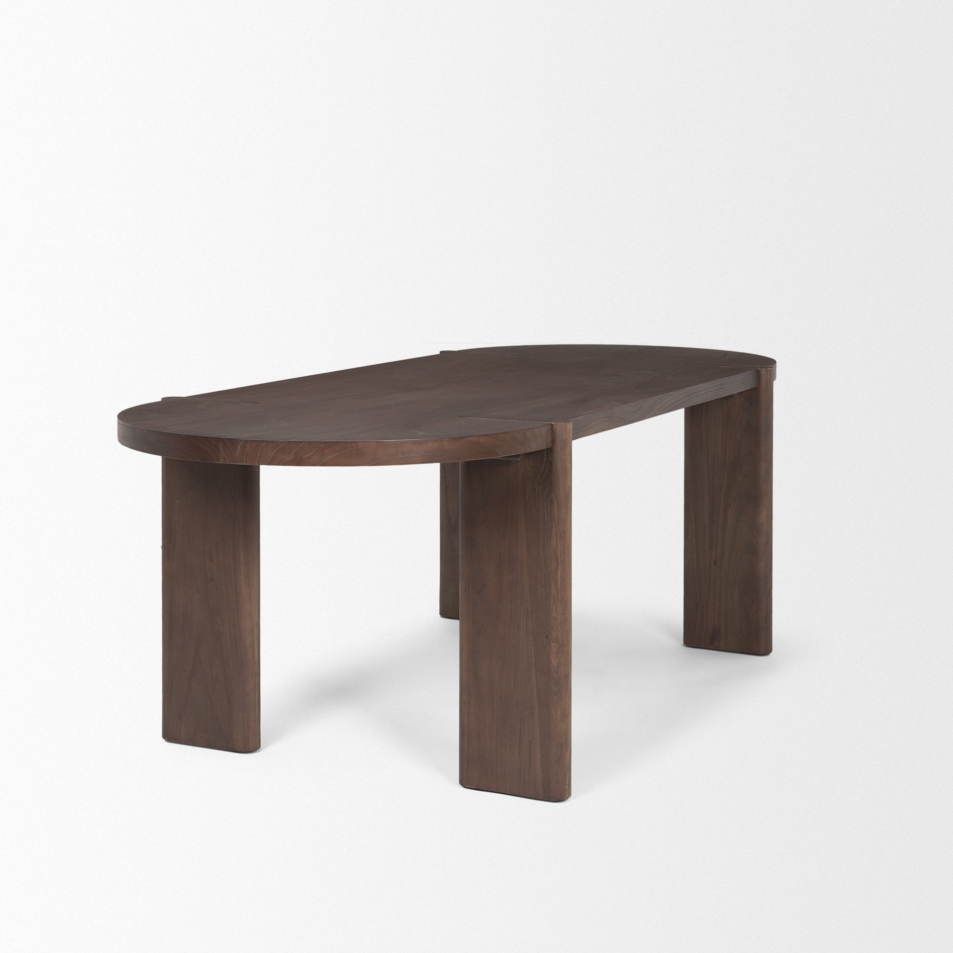 Front view of the Sohan oval dining table in a dark elm wood finish featuring smooth rounded edges and sturdy trestle leg supports