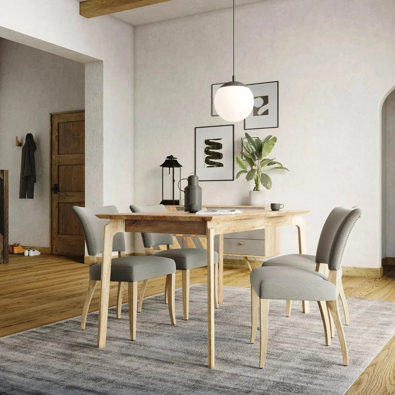 Front view of the Kenzo dining table in a light natural mango wood finish featuring a minimalist rectangular top and rounded tapered legs