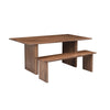 Perspective lifestyle shot showcasing the bench positioned under a large rectangular wood table in a bright modern space