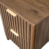 Close-up perspective focusing on the thick wood top and the rhythmic vertical slat motif of the drawers