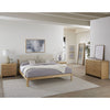 Wide lifestyle perspective showcasing the Havn nightstand as part of a cohesive bedroom collection with a matching dresser and mirror