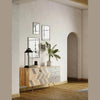 Perspective lifestyle view highlighting the slim profile and unique chevron texture of the sideboard in a hallway setting