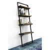 Close-up perspective view focusing on the upper shelves styled with professional office decor