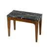High-angle perspective view showcasing the polished marble tabletop texture and the elegant curves of the wood frame