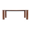 High-angle perspective view showcasing the expansive tabletop surface and the organic feel of the rounded legs