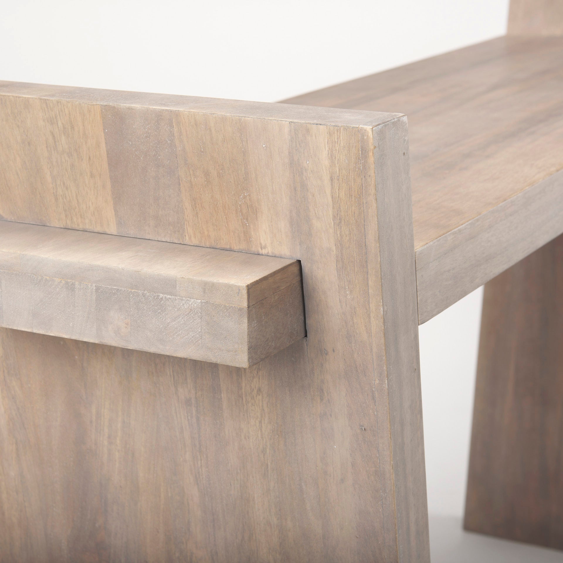 Detailed view highlighting the precise construction and structural assembly of the flared leg base