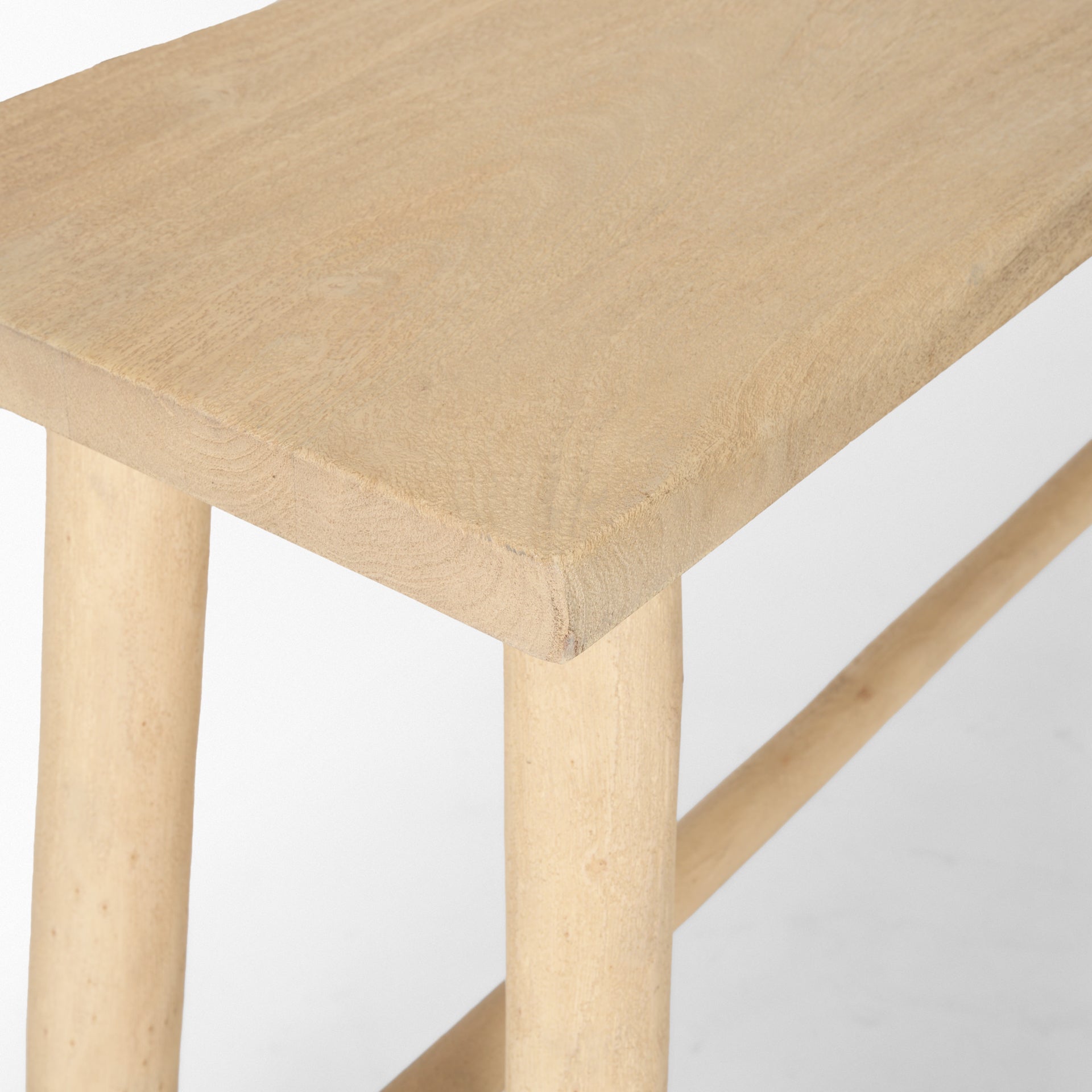Front view of the Sekou console table in light brown natural wood featuring a minimalist craftsman design and organic tapered legs