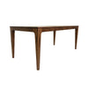 High-angle perspective view emphasizing the tapered leg detail and the sturdy rectangular tabletop