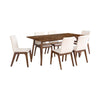 Perspective lifestyle shot featuring the table paired with a mix of white and brown contemporary dining chairs