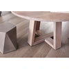 Three-quarter perspective view highlighting the architectural X-style pedestal base and the smooth light grey wood grain texture