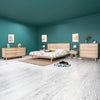 Full room lifestyle perspective showcasing the Gia dresser as part of a complete master suite including a matching bed frame