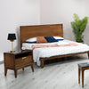 Wide-angle lifestyle shot showcasing the Allure nightstand as part of a complete master suite including a matching bed and dresser