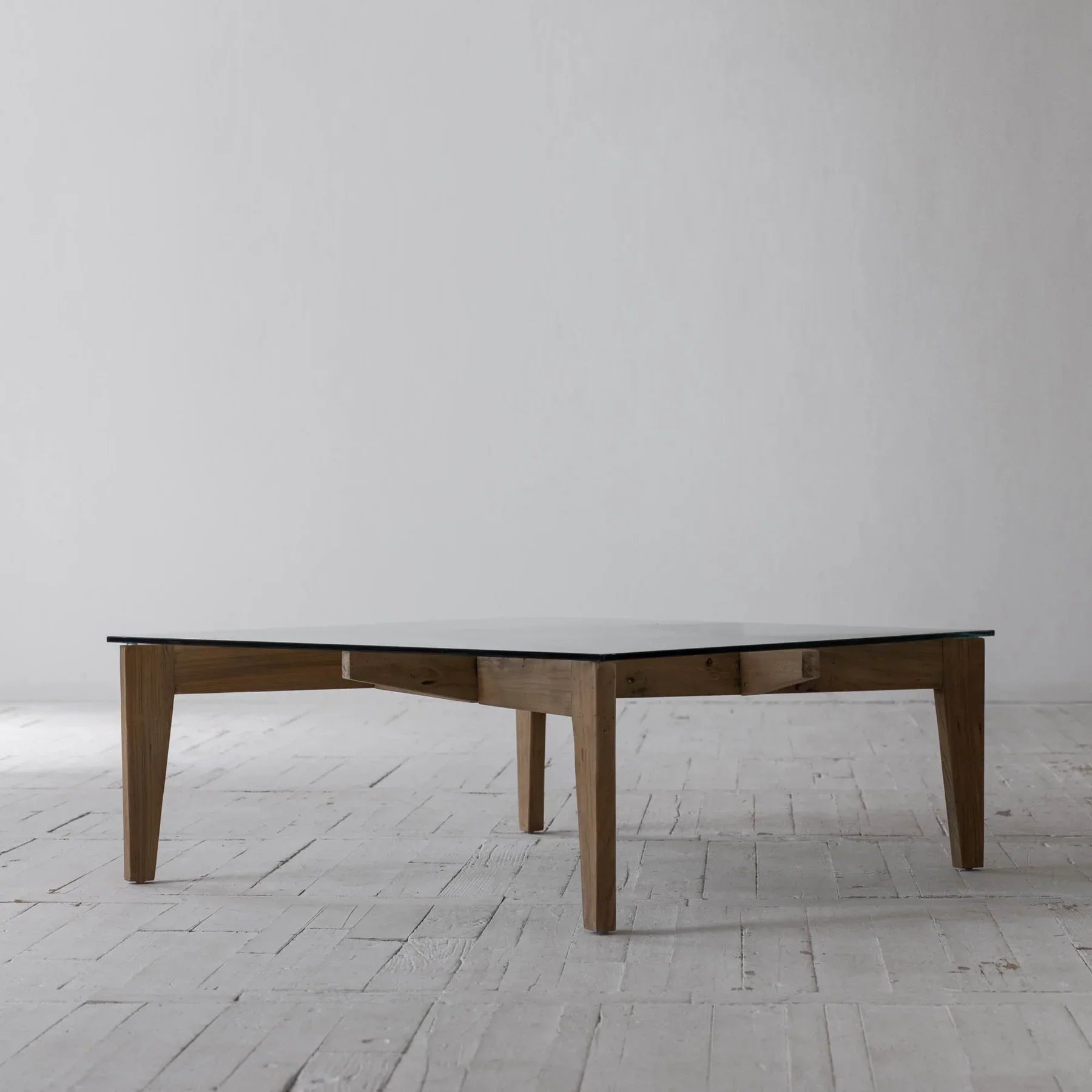 Detailed shot focusing on the natural wood grain texture and the open lower storage shelf for books or decor