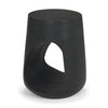 Front perspective of the sculptural side table in a matte black finish showcasing its bold monolithic form