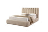 Three-quarter perspective view highlighting the plush upholstered frame and the soft organic curves of the scalloped headboard