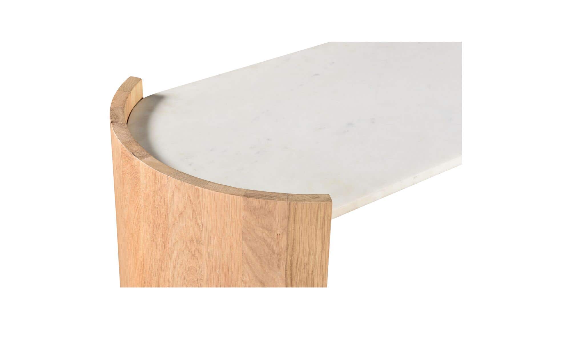 Close-up shot highlighting the seamless integration where the white marble top meets the architectural curved oak frame