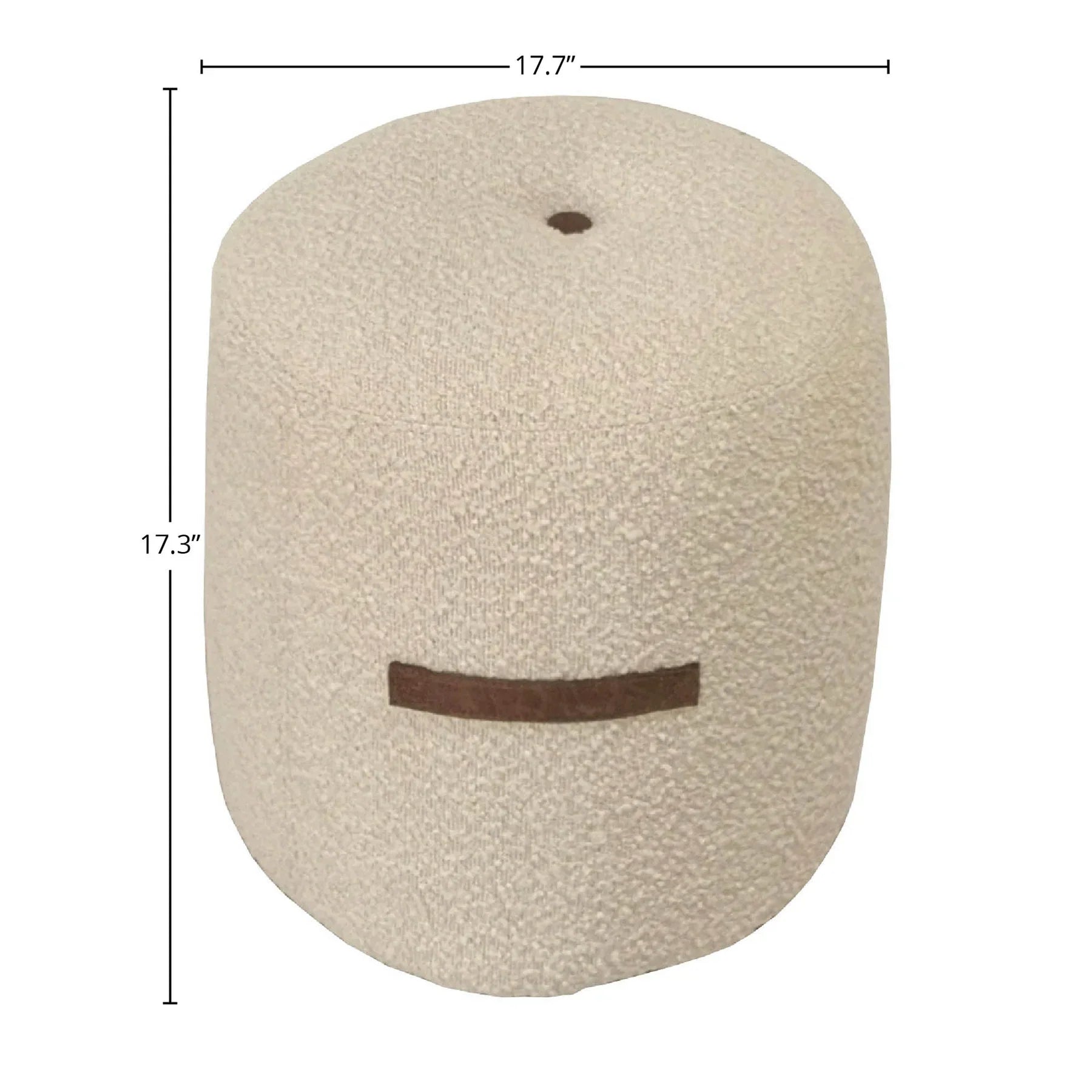 Front view of the Cushy cylindrical ottoman featuring cream bouclé upholstery and a decorative brown leather-style horizontal handle