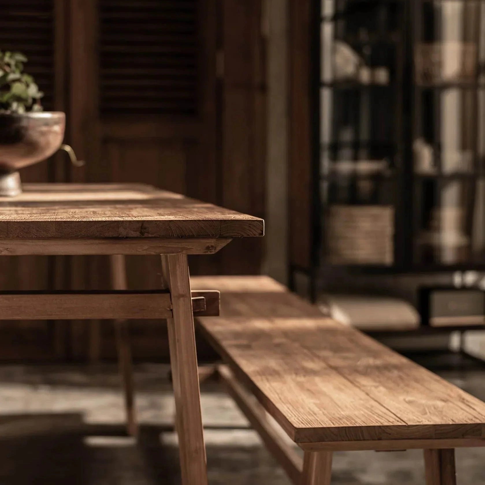 Front view of the D-Bodhi Artisan bench showcasing its long minimalist profile and natural reclaimed wood texture