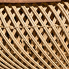 Macro shot of the intricate diagonal abaca weave pattern on the table base