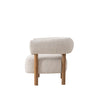 Front view of Dagny upholstered accent chair with wood legs