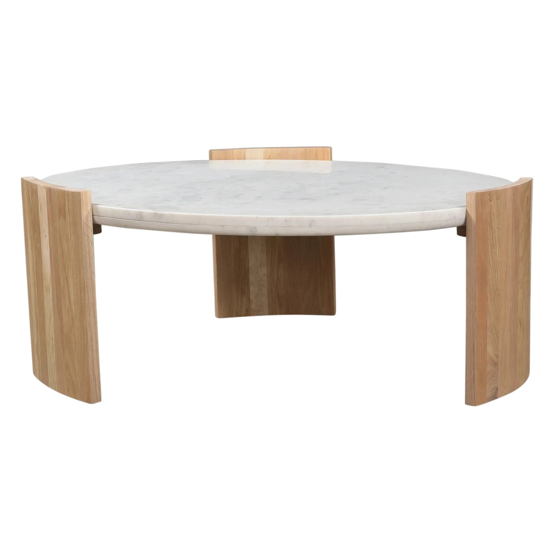 Front view of the Dala coffee table featuring a thick circular white marble top and three sculptural curved wood legs