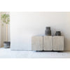 Wide-angle lifestyle shot featuring the Renaissance sideboard styled with minimalist ceramics and natural greenery in a bright contemporary room