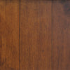 Macro shot highlighting the natural knots and dark mineral streaks characteristic of the African dusk pine finish