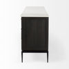 Side profile view highlighting the slender black metal leg frame and the clean architectural silhouette