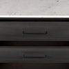 Close-up view of the three stacked drawers highlighting the smooth wood grain and minimalist design