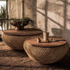 Lifestyle shot showing a pair of D-Bodhi Wave coffee tables in different sizes styled in a sunlit coastal-inspired interior