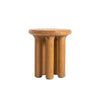 Straight-on view showcasing the clean lines and symmetrical arrangement of the thick cylindrical legs