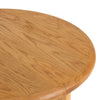 Close-up detail highlighting the seamless joinery where the marble top meets the walnut wood corner