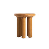 Profile shot highlighting the balanced proportions and sturdy architectural four-leg base of the natural oak side table