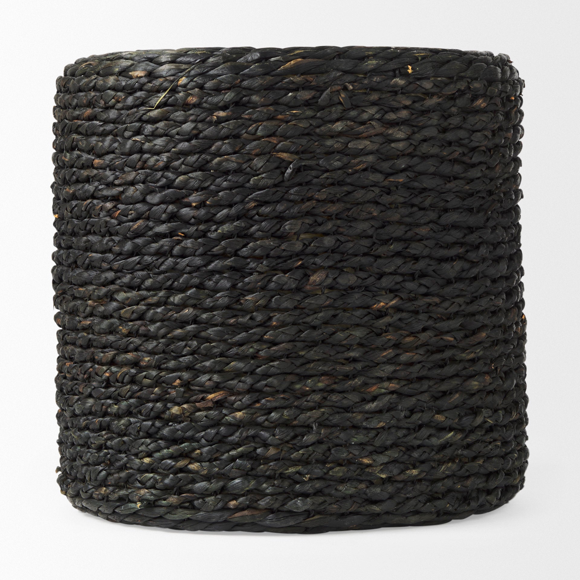 Direct front perspective of the cylindrical Dina pouf showcasing the thick horizontal woven texture and matte black finish