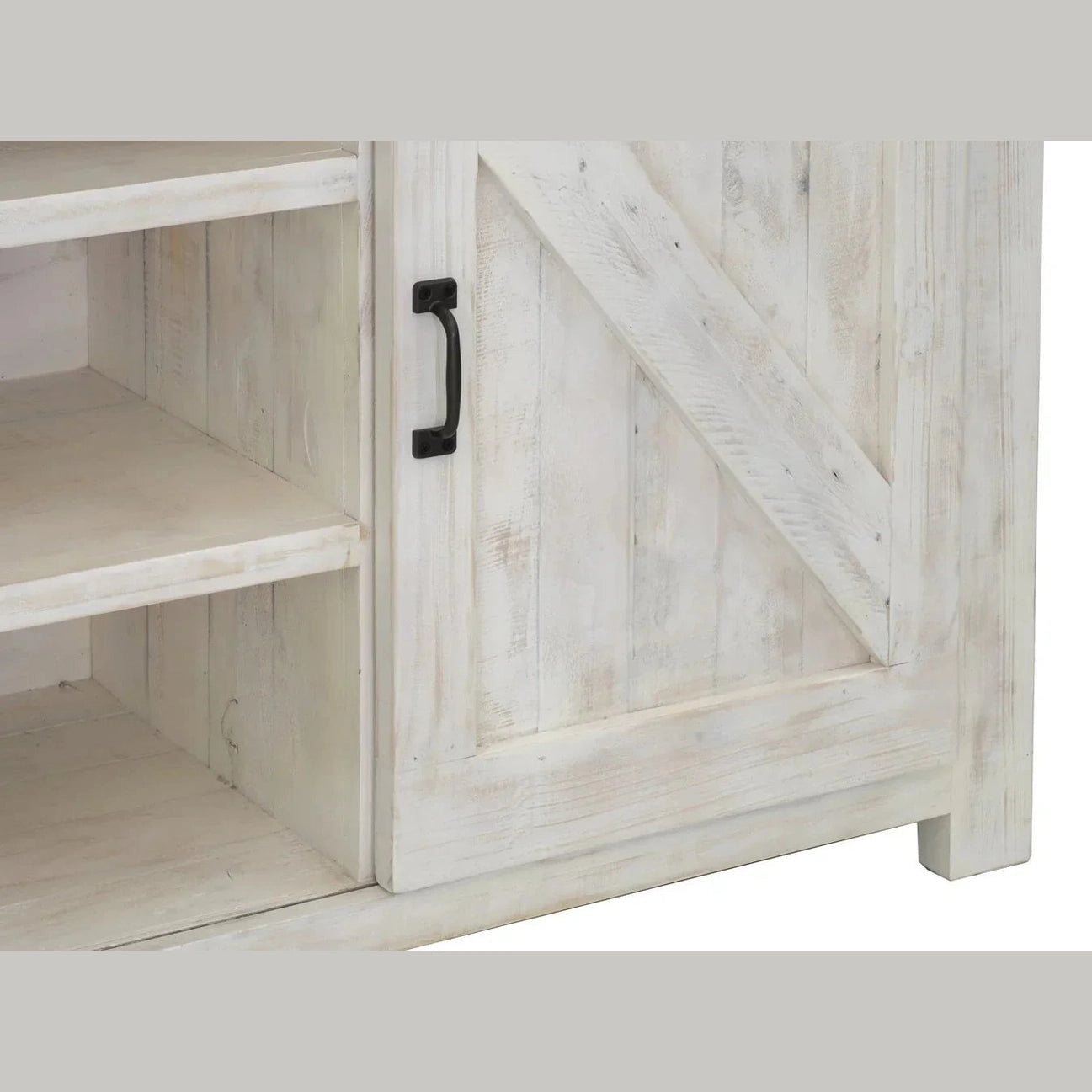 Front view of the Provence sideboard featuring a distressed white finish with two sliding barn doors and a natural brown wood top