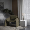 Dolce accent chair in olive green styled in a living room