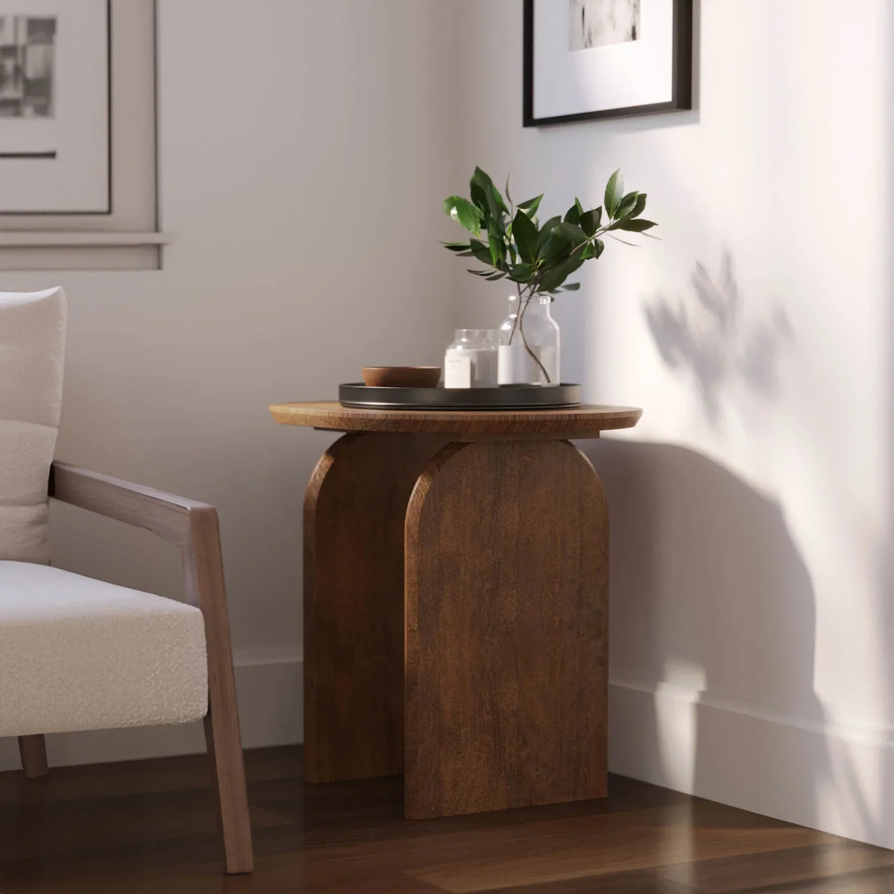 Side profile view emphasizing the slender depth of the vertical slab supports and the overhanging oval tabletop
