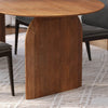 Wide-angle lifestyle shot of the walnut dining table as the centerpiece of a contemporary, open-concept living space