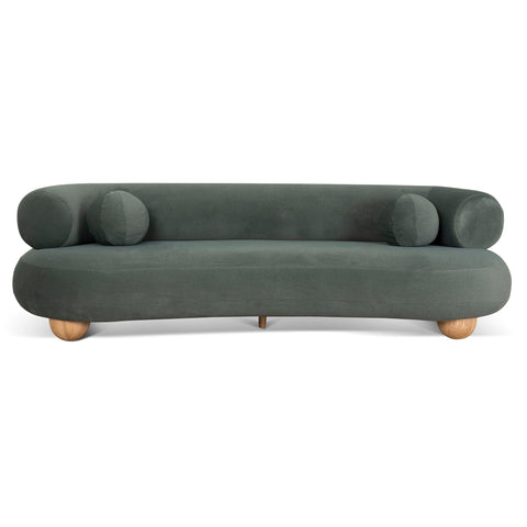 Ebba sofa in textured cream fabric with rounded arms and decorative circular pillows