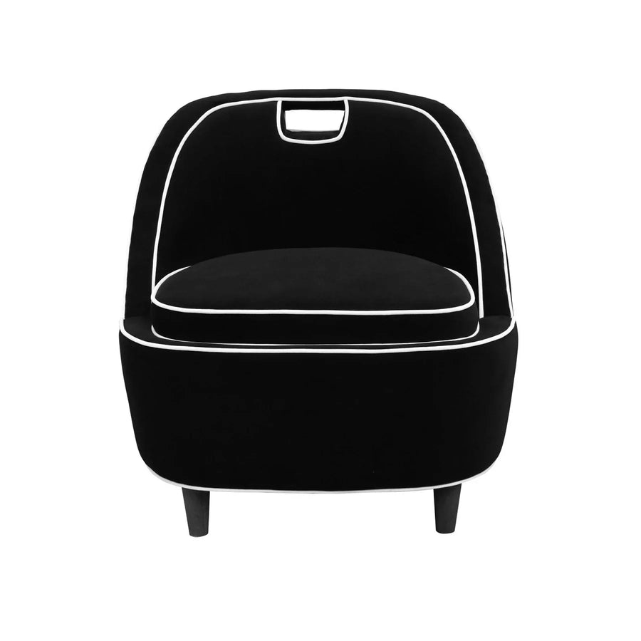 Front view of the Ebony Club Chair in black velvet with distinctive white piping and a rounded silhouette