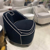 A deep navy blue variant of the Ebony chair styled in a bright modern interior